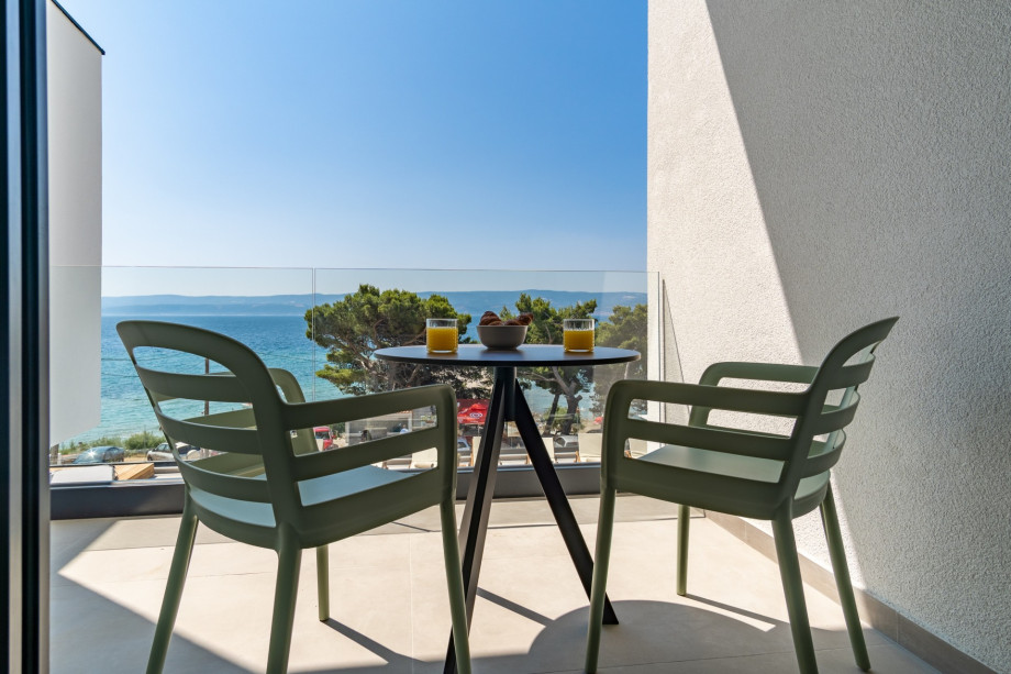 Bedroom No3 offers an exit to a terrace with a table for two