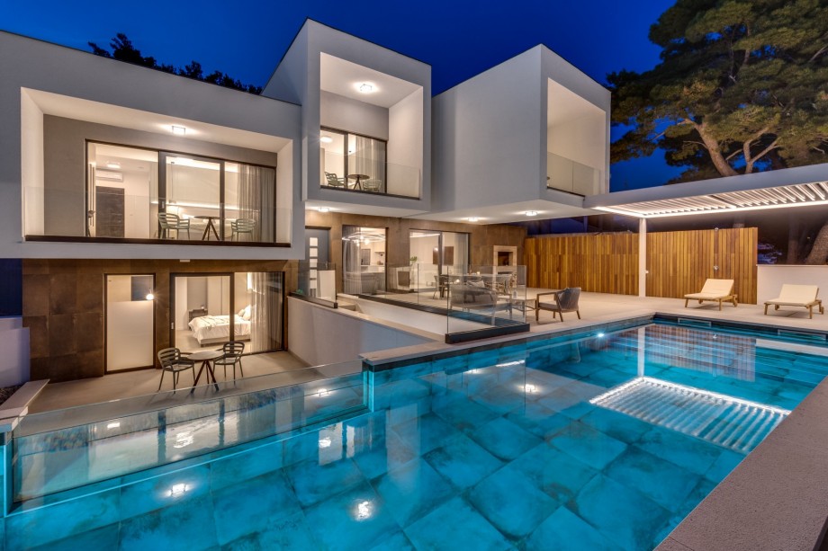 The whole property is fully fenced, and there are 4 parking places on the private plot