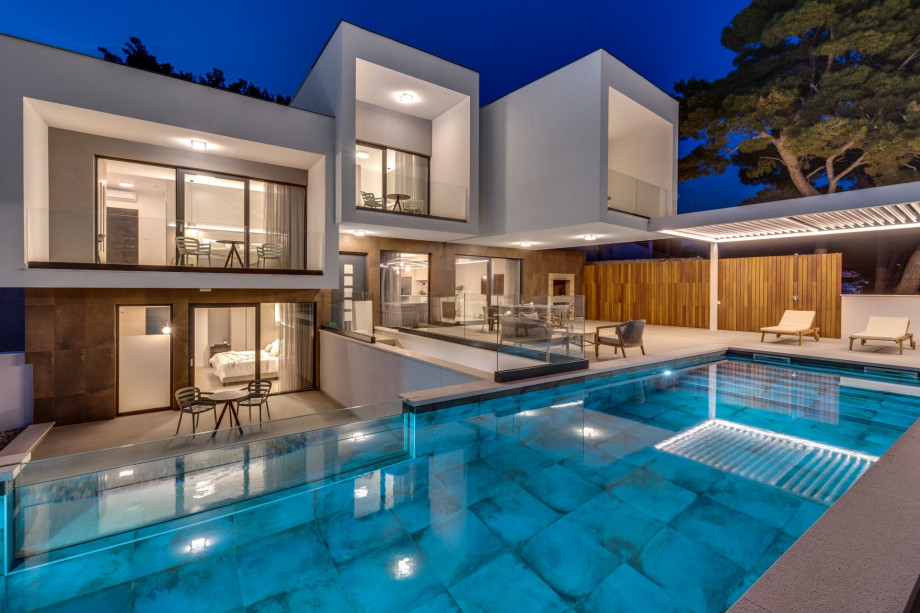 The whole property is fully fenced, and there are 4 parking places on the private plot