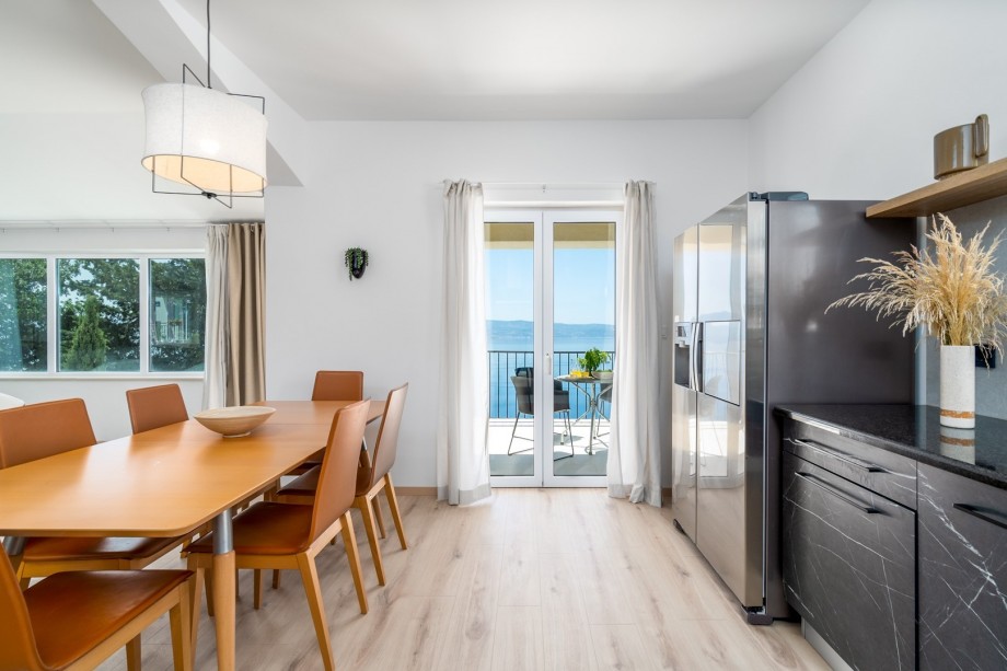 Dining area with exit to a terrace with sea views, Family bathroom with a shower, toilet and a bidet, and another smaller family bathroom with a shower and a toilet
