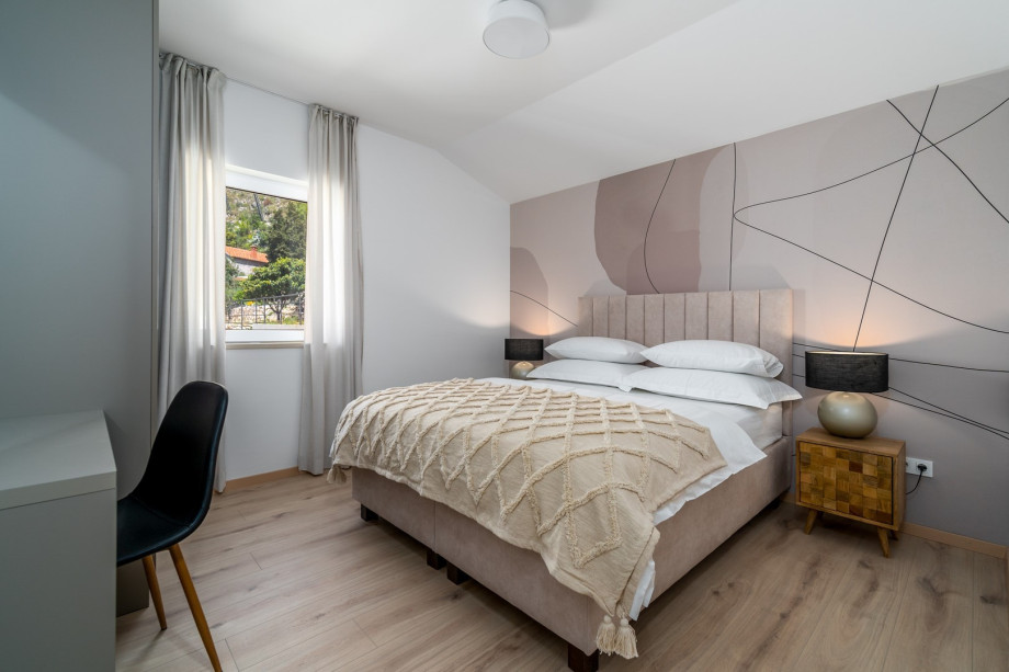 A Bedroom No2 (12sqm) with queen size bed 160cm x 200cm, A/C .