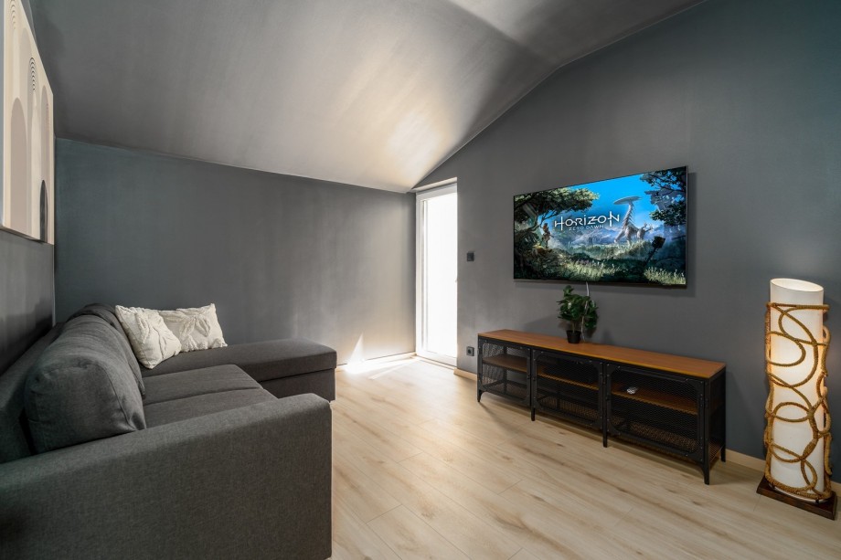 Cinema room (12sqm) with a TV, A/C, Play station, sofa (can convert into a sofa bed) and glass door to approach the pool area from this floor