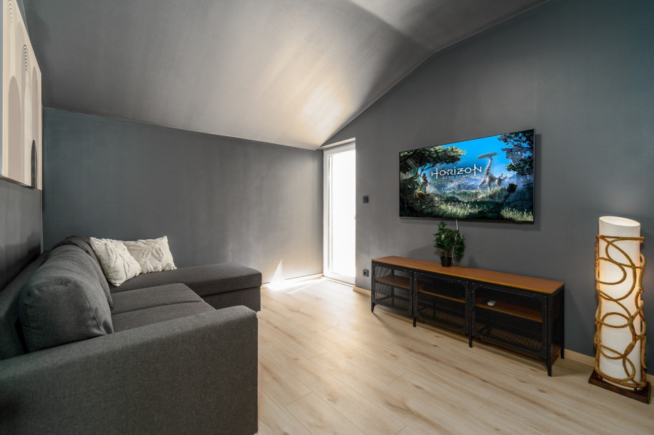 Cinema room (12sqm) with a TV, A/C, Play station, sofa (can convert into a sofa bed) and glass door to approach the pool area from this floor