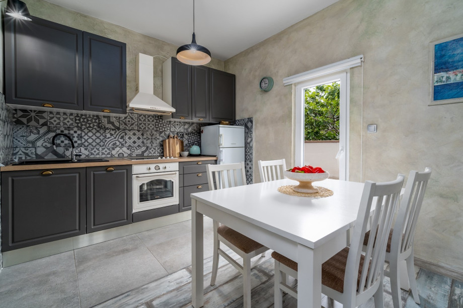 The ground floor offers a fully equipped kitchen with all the needed amenities you need