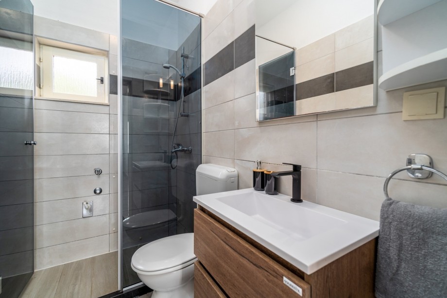 There is also a family bathroom with a shower.