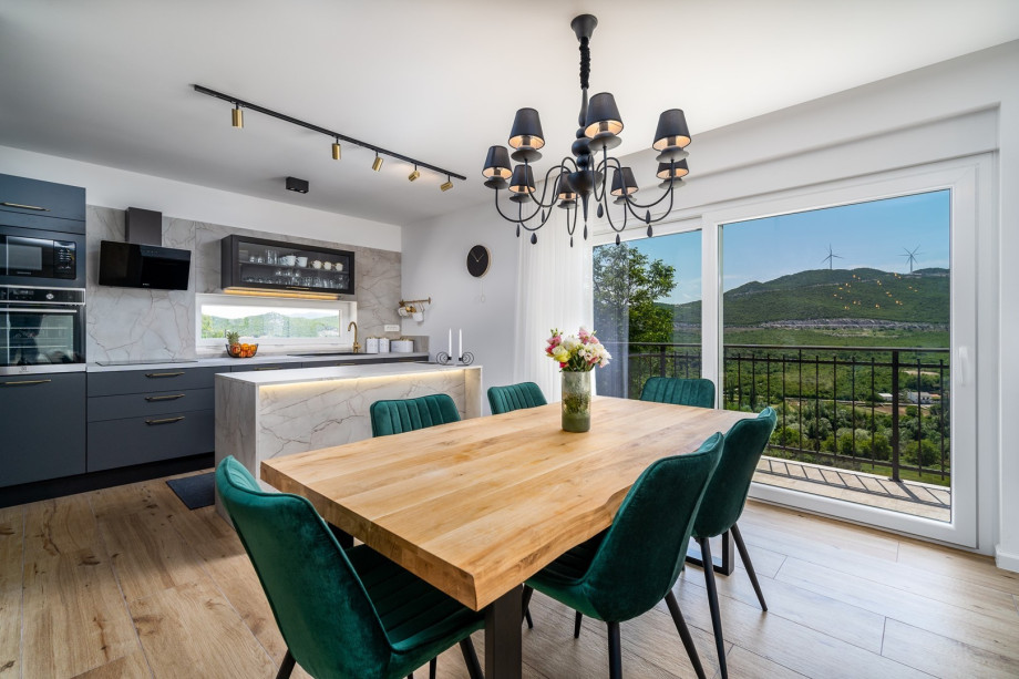 A fully equipped kitchen (microwave, oven, fridge with cold water and ice maker, filter coffee machine, Espresso coffee maker...)