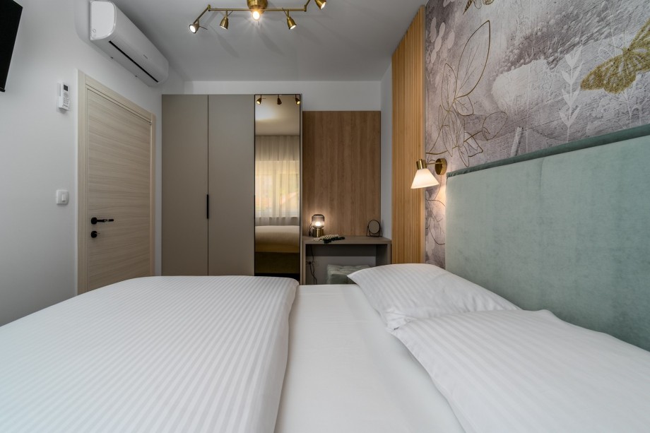 Bedroom No1 offers views of the natural surroundings and neighborhood