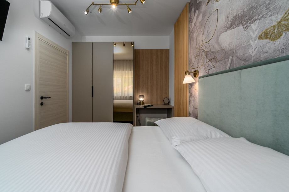 Bedroom No1 offers views of the natural surroundings and neighborhood