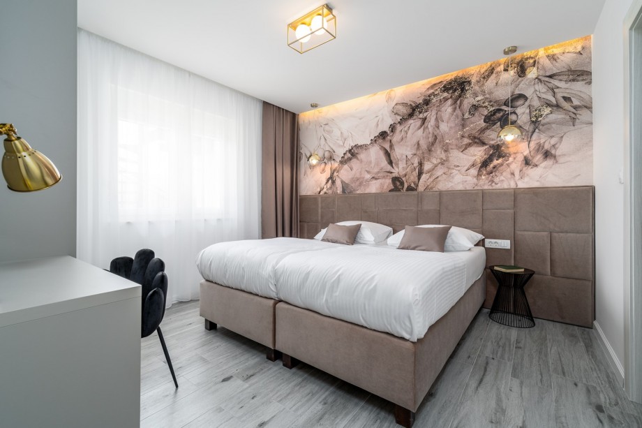 A Bedroom No3 with two single beds 90cmx 200cm that can connect to a king size bed