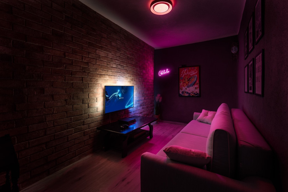 The lower ground floor (Jacuzzi level) offers a Media room with a TV, PS4, free WiFi, a comfortable sofa that can convert into a sofa bed for 2