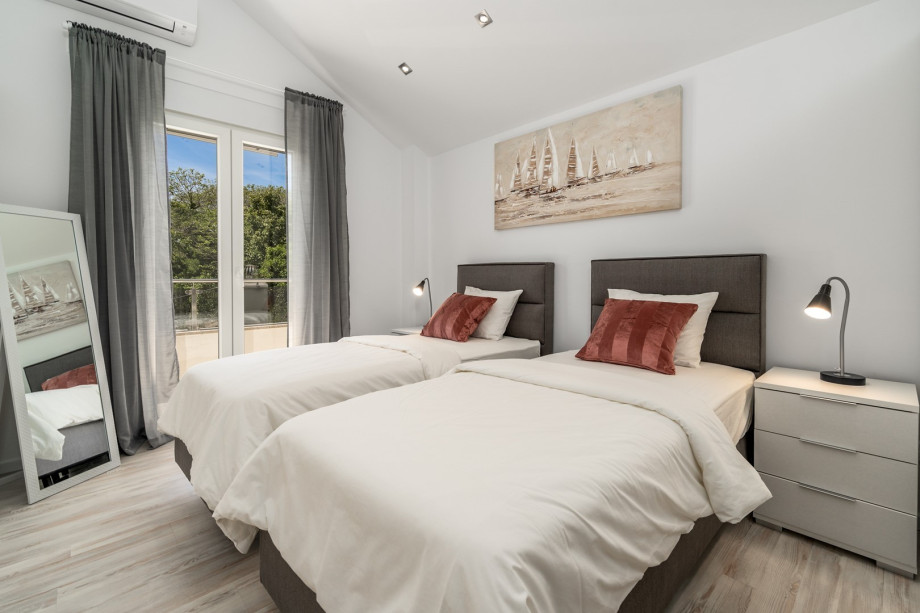 Bedroom No3 with two single beds 90cm x 200cm that can connect into a king size