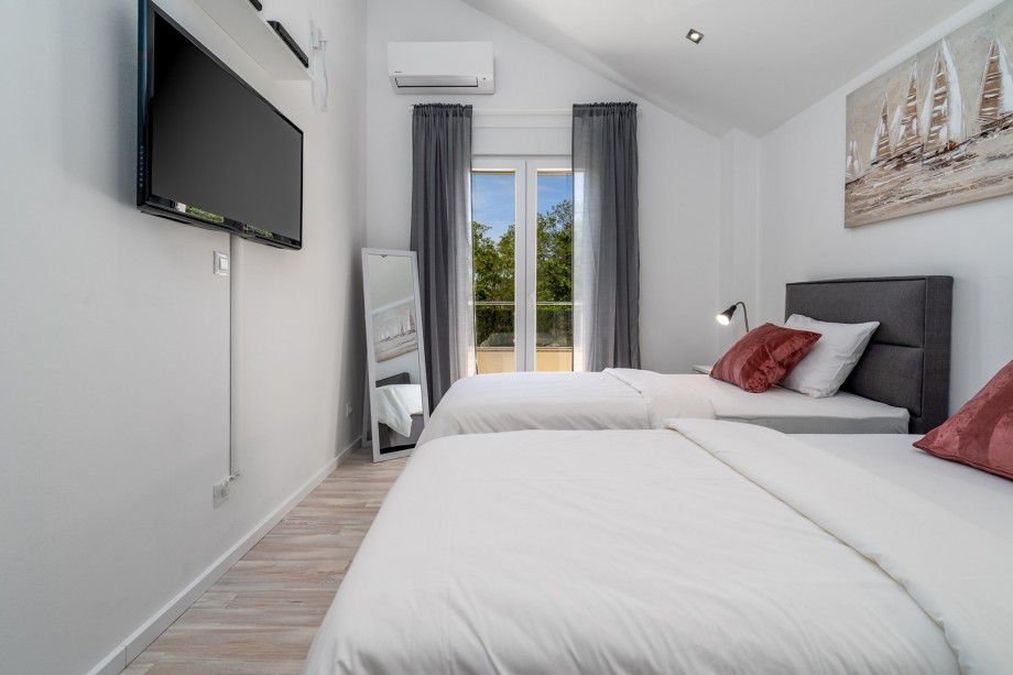 Air-condition, a TV, a balcony (3sqm) with views on the natural surroundings