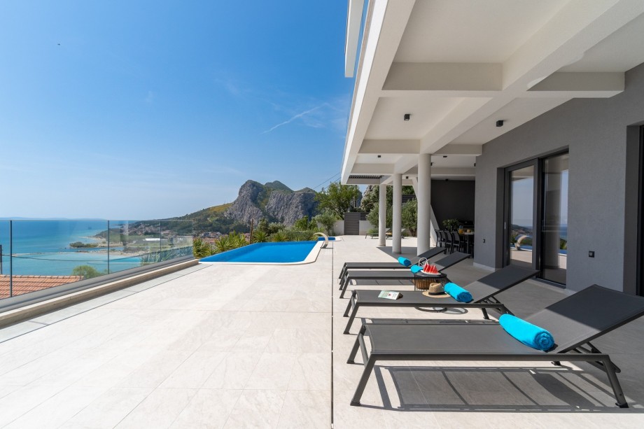 Amazing panoramic view on Omiš, sea, and island Brač