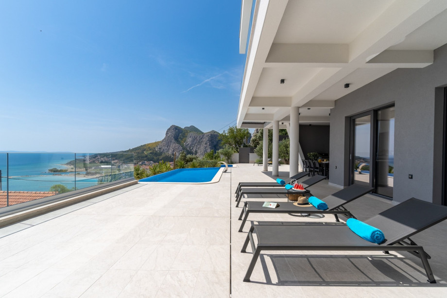 Amazing panoramic view on Omiš, sea, and island Brač