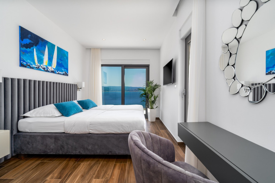 En-suite bedroom No.2 with double bed, AC, TV, sea view, separate terrace