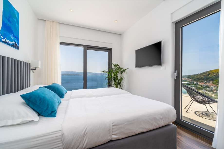 En-suite bedroom No.2 with double bed, AC, TV, sea view, separate terrace