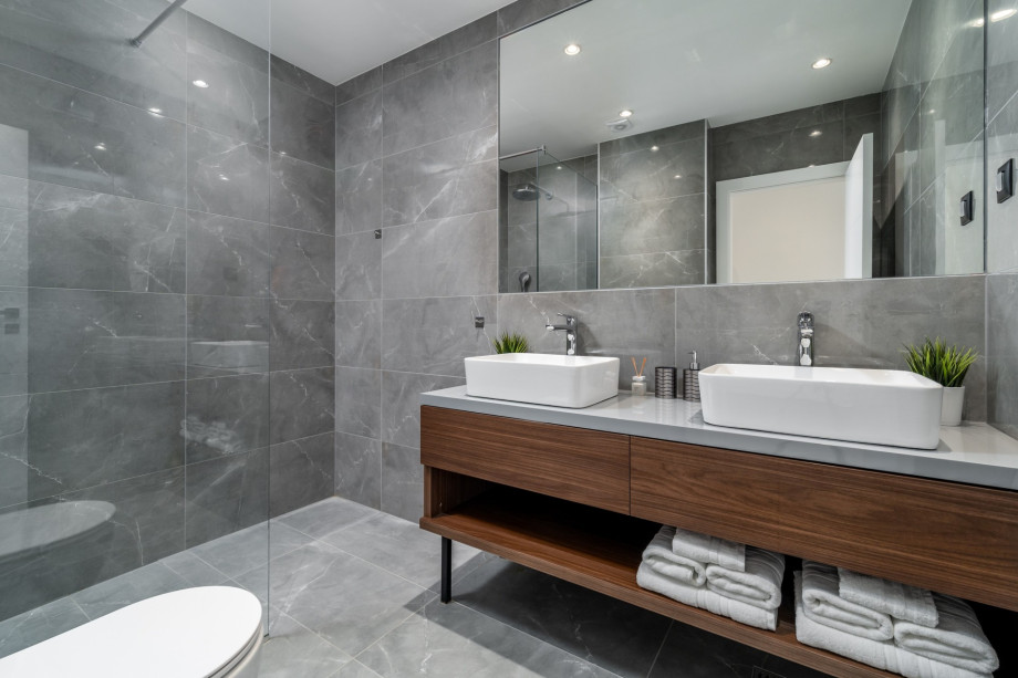 Family bathroom in bedroom No.2 with shower and two wash basins