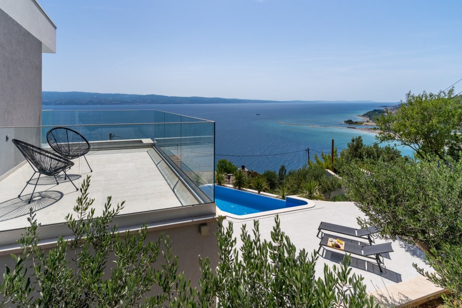 Amazing panoramic view on Omiš, sea, and island Brač