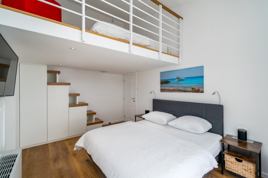 Bedroom No3 with a king-size bed 180cm x 200cm, and a few steps up takes you to an additional bed in the attic with 160cm x 200cm (fenced)