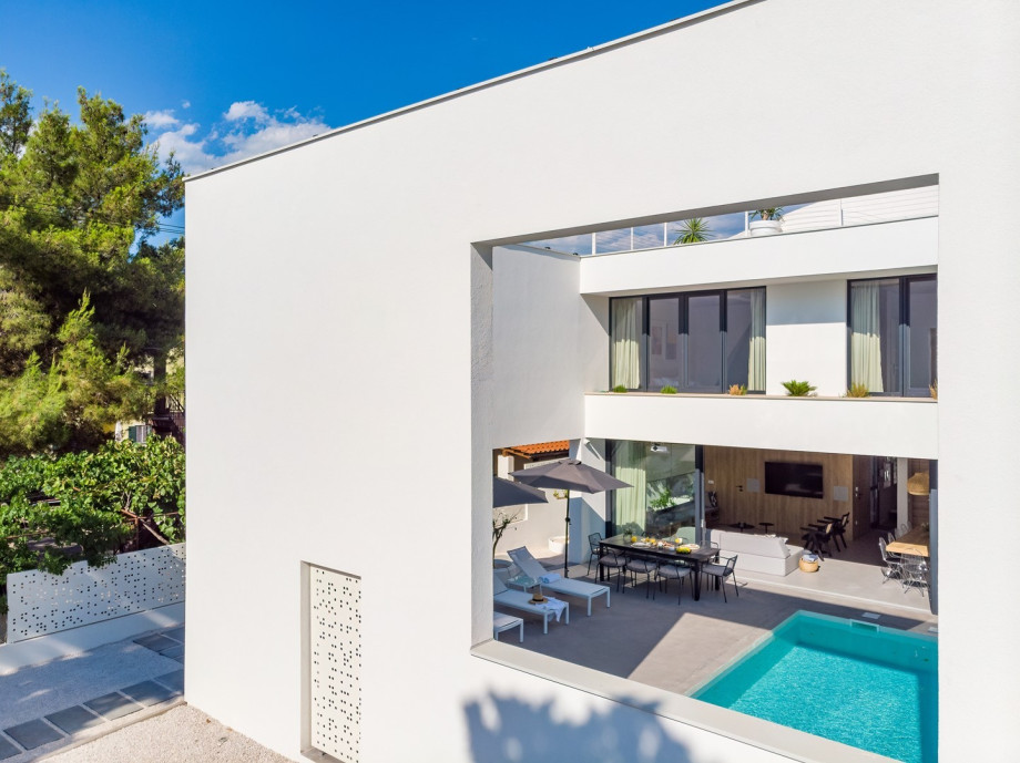 The indoors are fluidly connected with the outdoors, once you open the floor-to-ceiling glass doors.