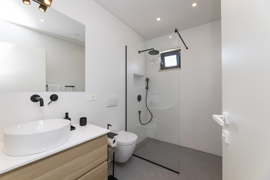 En-suite bathroom with a shower.