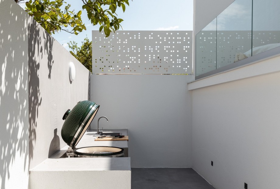 There is also a  barbecue (charcoal) behind the dining area.