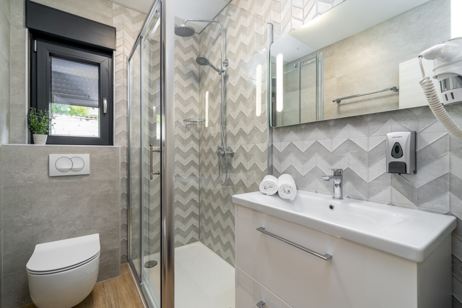 There is also a family bathroom with a shower used for Bedroom No2