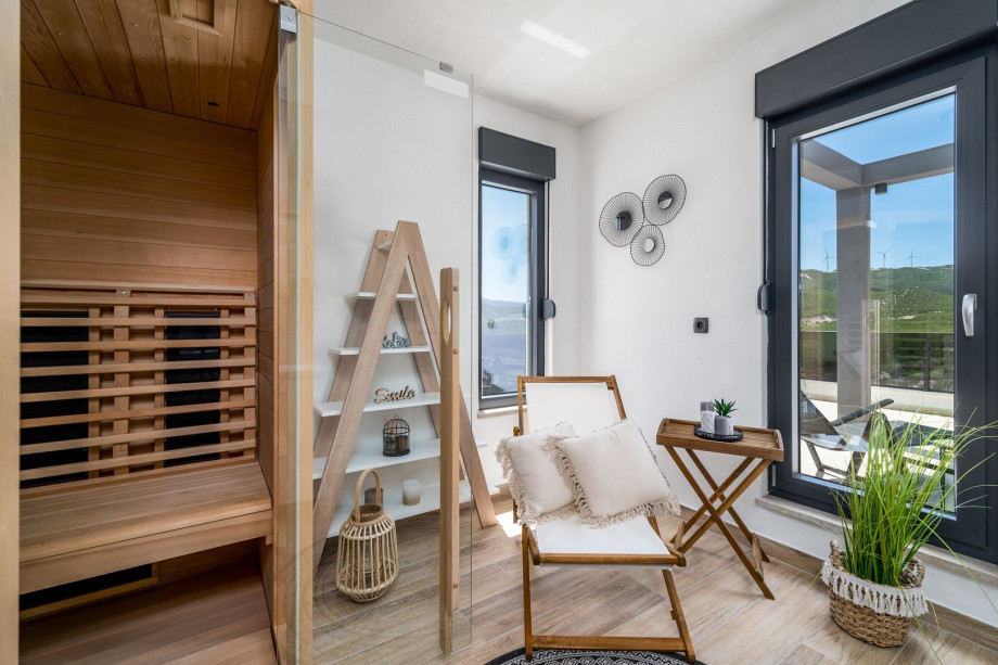 Sauna room (13sqm) with a shower and relaxing chair