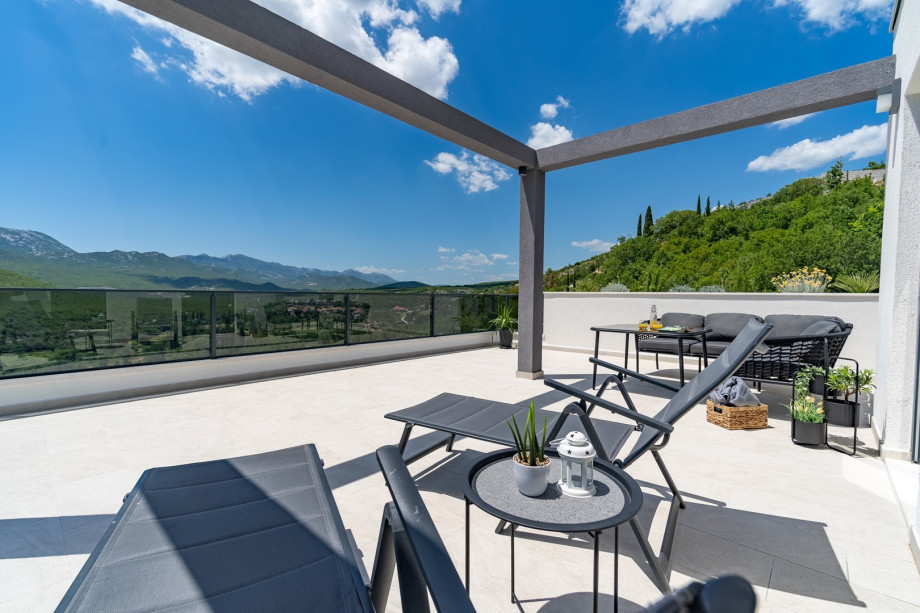 A terrace (50sqm) with a lounge corner and amazing views of the natural landscape and Cetina river