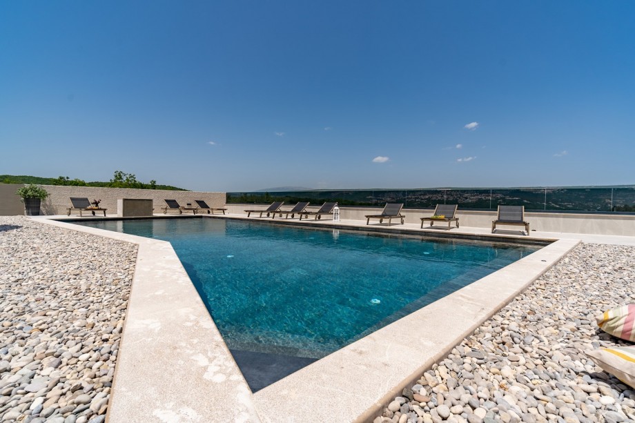 The sundeck area is spacious, partially covered with nice pebbles