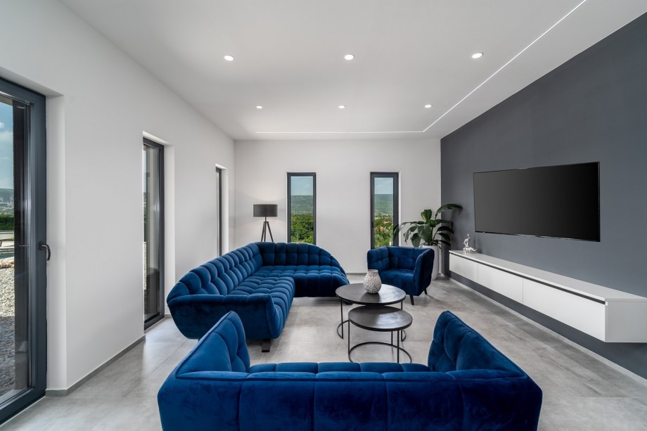 Comfortable living room with a smart TV, comfortable sofas, air-condition