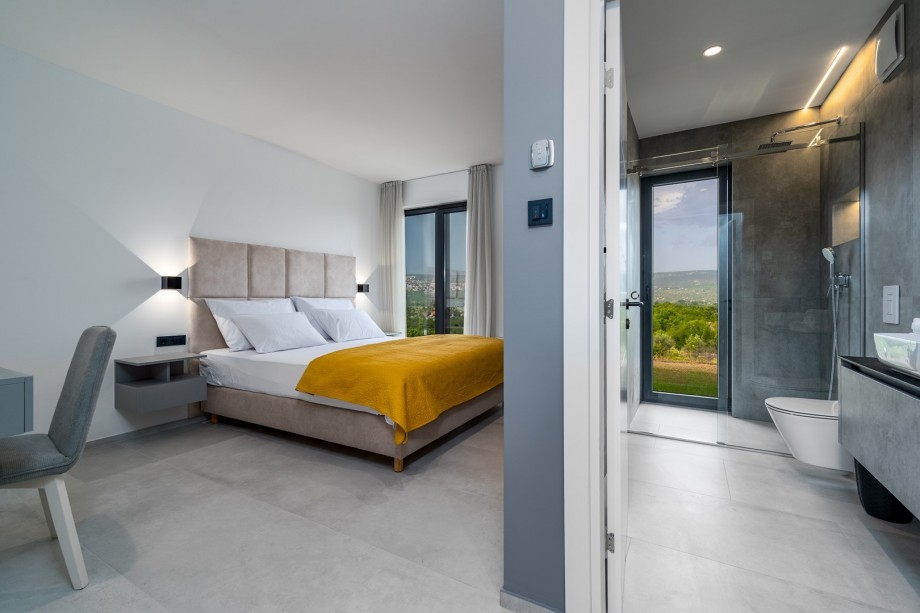 Bedroom No3 with a king size bed 180cm x 210cm, a TV, en-suite bathroom, and a make-up table