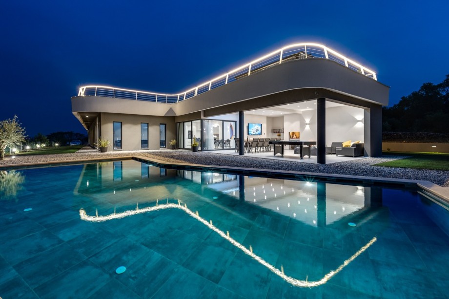 The very bright and extremely pleasant interior is provided by big glass walls toward the pool