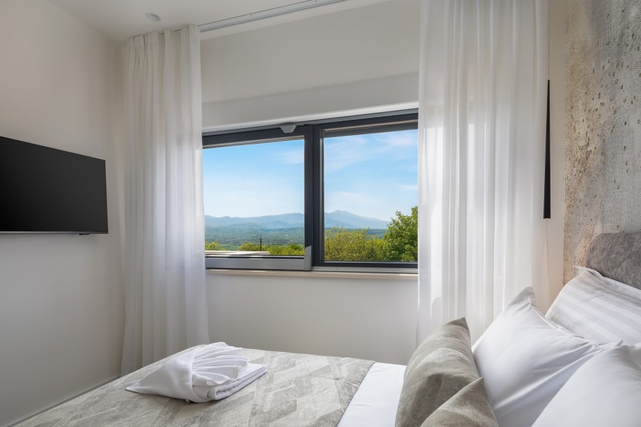 Bedroom No2  with A/C, TV, a bathroom next door