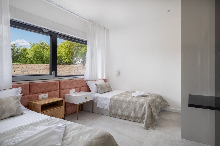 Bedroom No6 (10.5sqm) with two single beds 90cm x 200cm, A/C