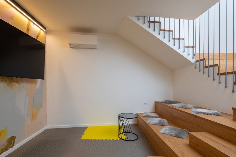 Villa Arya has an internal staircase a Media area (mini cinema area) with a wooden sitting area