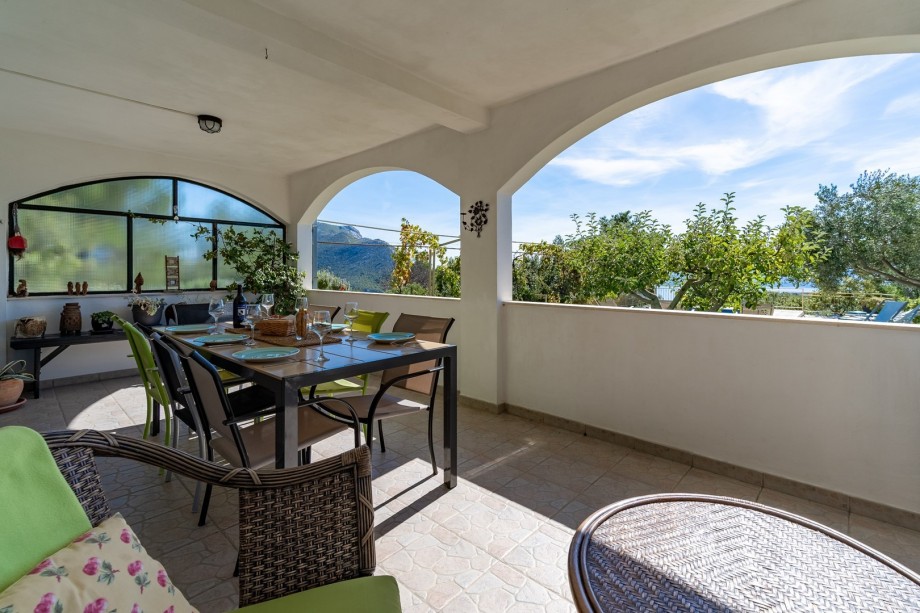 An outdoor dining area for 8 people with an amazing panorama