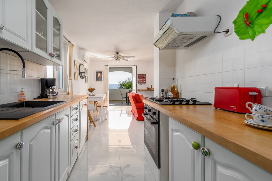 Fully equipped kitchen next to the dining area