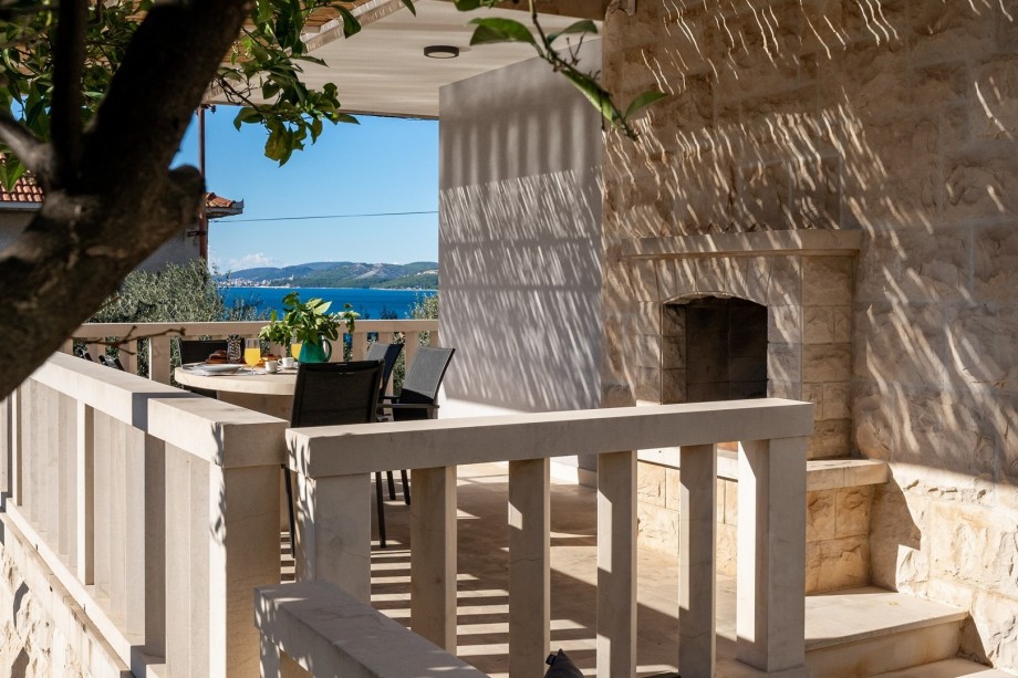 Covered outdoor dining area for pleasant meals.