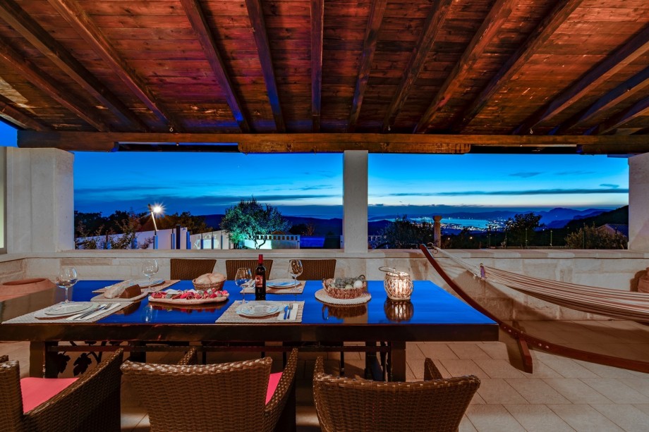 The covered dining area perfect for family or a romantic dinner