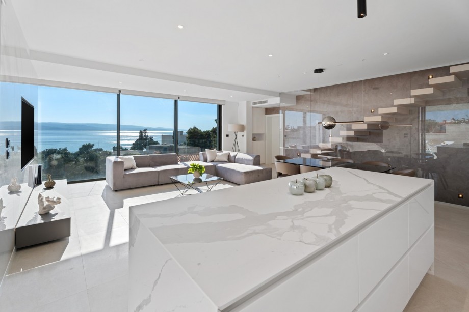 The Kitchen offers a microwave oven, a wine cooler, an ice maker, a Phillips LatteGo coffee maker, a filter for water...