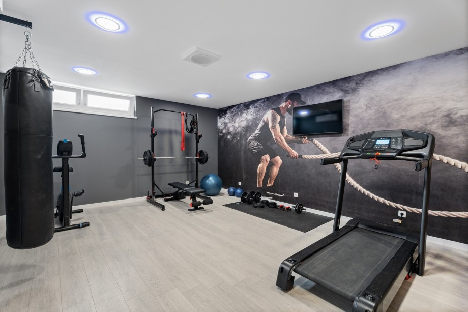 The fully equipped gym area includes a Fitness Multi-Use system
