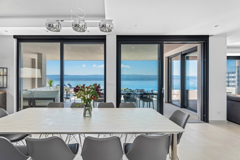 You can directly approach the pool area from the living room and the kitchen