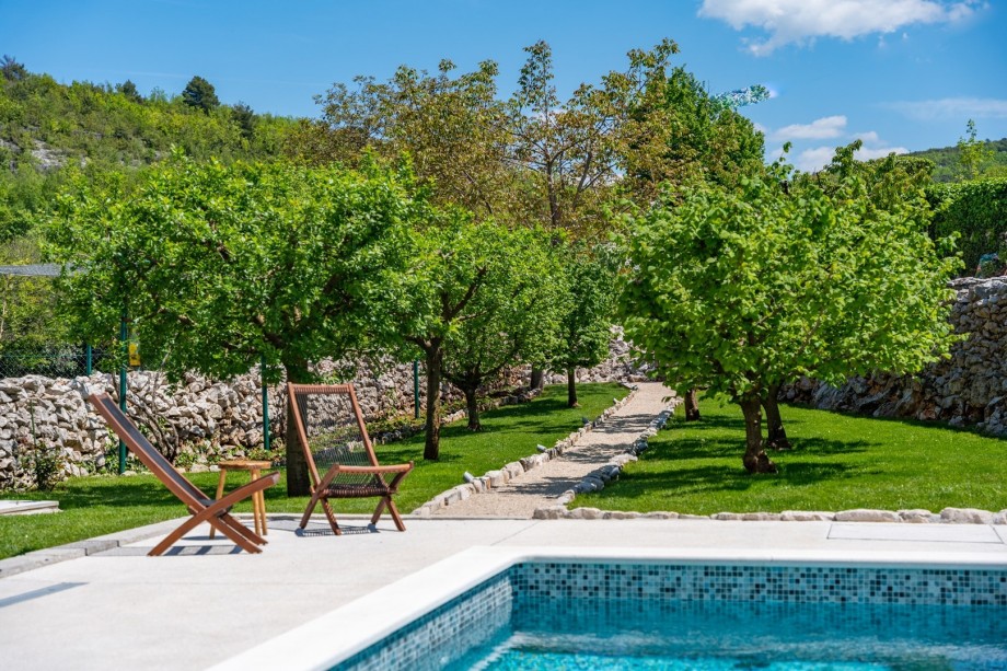 A basketball court, a mini football field and a training ground for street workouts with various equipment.