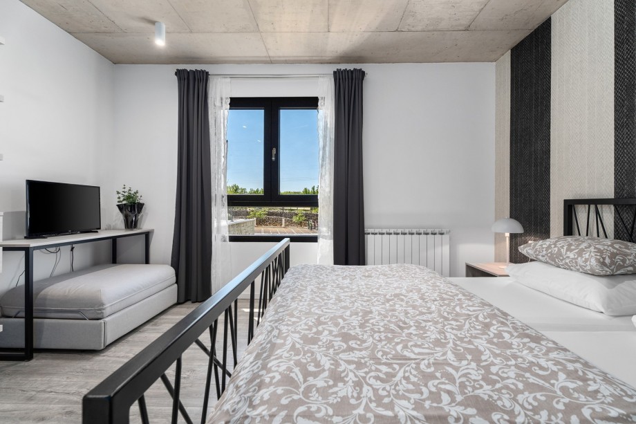 Bedroom NO1 with king size bed 180x200cm + a sofa bed for 1 person, TV, A/C,bath