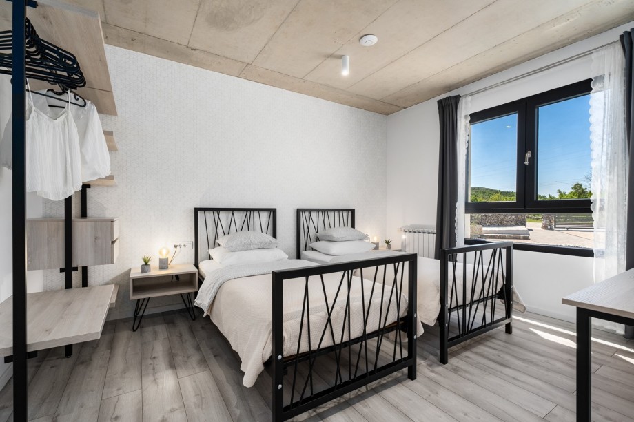 Bedroom NO2 with two single beds 90x200cm, A/C, TV a Play Station 4 , bath