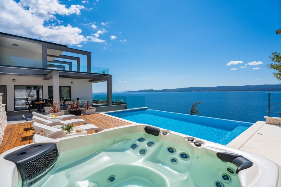 VILLA HRID with infinity heated pool with massage and private beach