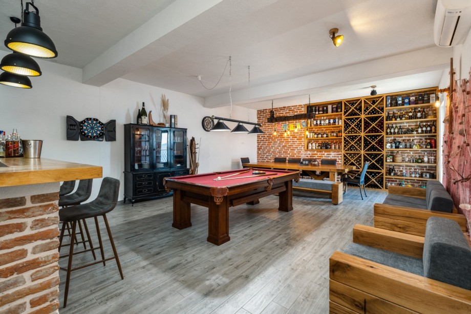 A closed indoor dining area with a fun zone is on the top floor