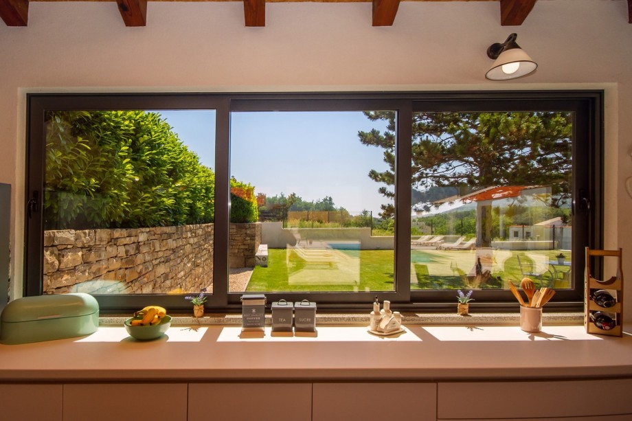 Fully equipped and spacious summer kitchen with TV and barbecue