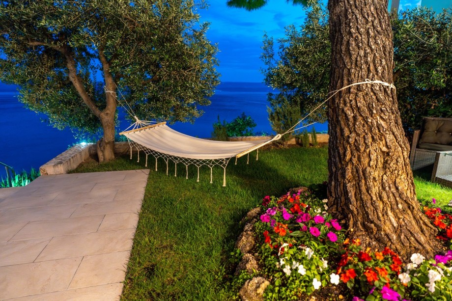 A perfect spot for enjoying the sunsets from this position garden toward the beach